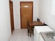 Dining room Postira, Dining room in the apartment.