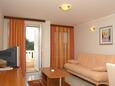 Obývací pokoj Seget Vranjica, Obývací pokoj v ubytování typu apartment, s klimatizací, domácí mazlíčci povoleni a WiFi.