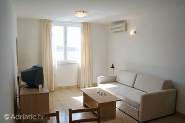 Vinjerac, Sala de estar in the apartment, air condition available y WiFi.