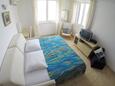Obývací pokoj Vinjerac, Obývací pokoj v ubytování typu apartment, s klimatizací a WiFi.