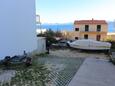 Parking lot Igrane, Makarska, Parking lot 311 - Apartments near sea with pebble beach.