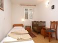 Ložnice Trpanj, Ložnice v ubytování typu apartment, domácí mazlíčci povoleni a WiFi.