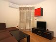 Obývací pokoj Tučepi, Obývací pokoj v ubytování typu apartment, s klimatizací a WiFi.