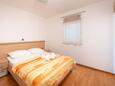 Спальня 1 Tučepi, Спальня 1 в размещении типа apartment, доступный кондиционер и WiFi.