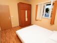 Rogoznica, Ložnice 1 v ubytování typu apartment, domácí mazlíčci povoleni a WiFi.