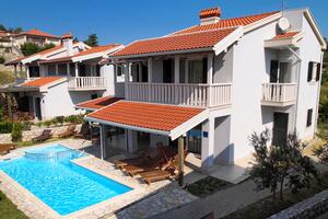 Family friendly apartments with a swimming pool Palit, Rab - 3211