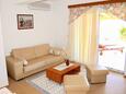 Kampor, Living room in the apartment, air condition available and WiFi.