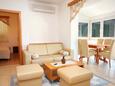 Kampor, Living room in the apartment, air condition available and WiFi.