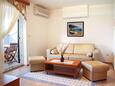 Living room Kampor, Living room in the apartment, air condition available and WiFi.