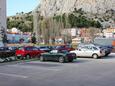 Parking lot Omiš, Omiš, Parking lot 3253 - Apartments with sandy beach.