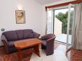 Living room 1 Rogoznica, Living room 1 in the apartment, air condition available, (pet friendly) and WiFi.