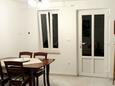 Nerezine, Dining room in the apartment, air condition available and WiFi.