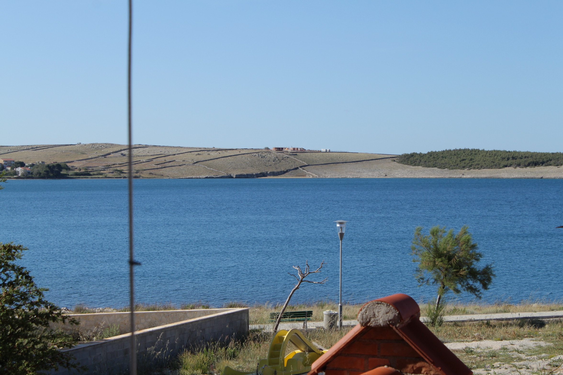 One bedroom apartment with terrace and sea view Povljana, Pag  A-b
