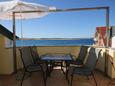 Terrace Povljana, Terrace in the apartment, with a sea view, (pet friendly) and WiFi.