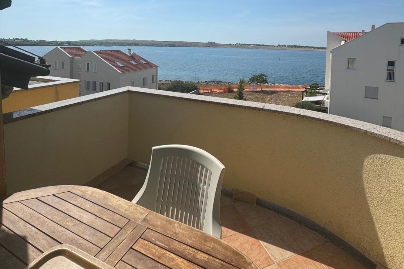 Two bedroom apartment with terrace and sea view Povljana, Pag (A-3316-g)