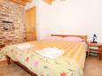 Ložnice 1 Orihi, Ložnice 1 v ubytování typu house, s klimatizací, domácí mazlíčci povoleni a WiFi.
