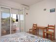 Dining room Verunić, Dining room in the studio-apartment, air condition available, (pet friendly) and WiFi.