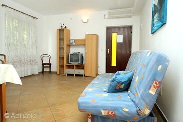 Molunat, Sala de estar in the apartment, air condition available, (pet friendly) y WiFi.