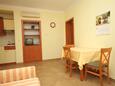 Dining room Mali Lošinj, Dining room in the apartment, air condition available and WiFi.