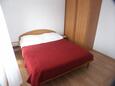 Punta križa, Bedroom in the apartment, air condition available and WiFi.