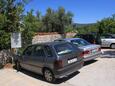 Parking lot Valun, Cres, Parking lot 386 - Apartments near sea with pebble beach.