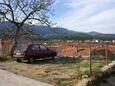 Parking lot Jelsa, Hvar, Parking lot 4001 - Apartments near sea with pebble beach.