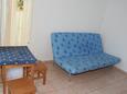 Obývací pokoj Jakišnica, Obývací pokoj v ubytování typu room, domácí mazlíčci povoleni a WiFi.