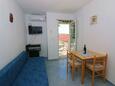 Dining room Kustići, Dining room in the apartment, air condition available and WiFi.