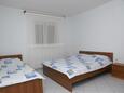 Ložnice Kustići, Ložnice v ubytování typu apartment, s klimatizací, domácí mazlíčci povoleni a WiFi.