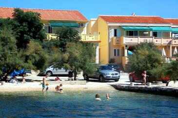 Property Kustići, Pag, Property 4088 - Apartments near sea with pebble beach.