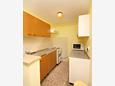 Kitchen Njivice, Kitchen in the apartment, (pet friendly) and WiFi.