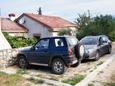 Parking lot Njivice, Krk, Parking lot 410 - Apartments with pebble beach.