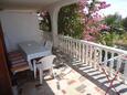 Terrace 1 Novalja, Terrace 1 in the apartment, s pogledom na more.