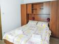 Caska, Bedroom in the apartment, air condition available and WiFi.