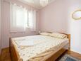 Спальня 1 Novalja, Спальня 1 в размещении типа apartment, WiFi.