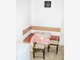 Smokvica, Dining room in the studio-apartment, air condition available and WiFi.