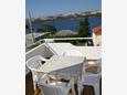 Shared terrace Stara Novalja, Shared terrace in the apartment, s pogledom na more.