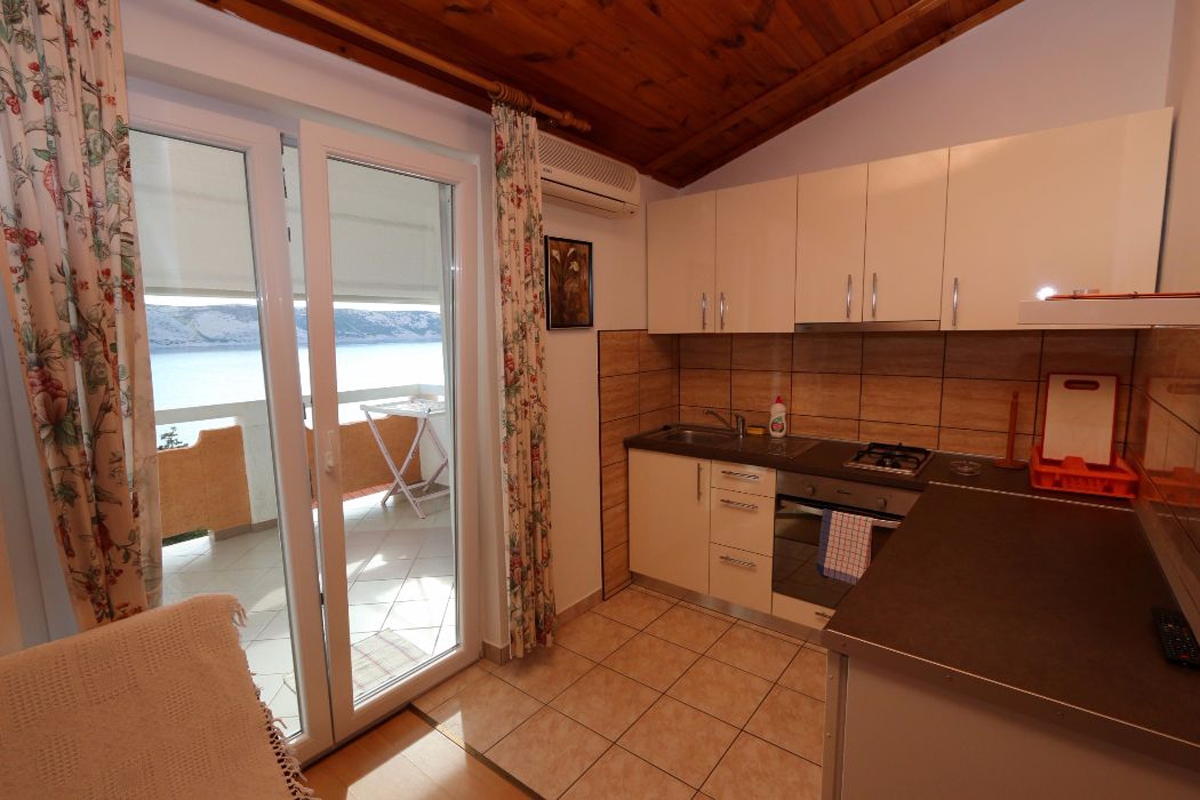 One bedroom apartment near beach Stara Novalja, Pag  A-c