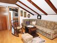 Kornić, Living room in the apartment, air condition available, (pet friendly) and WiFi.