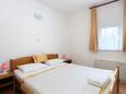 Rogoznica, Спальня 1 в размещении типа apartment, доступный кондиционер и WiFi.