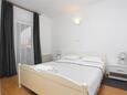 Rogoznica, Bedroom 1 in the apartment, air condition available and WiFi.