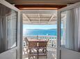 Brodarica, Terrace in the apartment, with a sea view and WiFi.