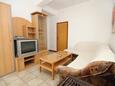 Obývací pokoj Vlašići, Obývací pokoj v ubytování typu apartment, s klimatizací a WiFi.