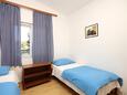 Lavdara, Ložnice 2 v ubytování typu apartment, domácí mazlíčci povoleni a WiFi.