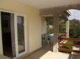 Lumbarda, Terrace in the apartment, with a sea view.