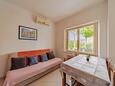 Dining room Lumbarda, Dining room in the apartment, air condition available, (pet friendly) and WiFi.