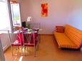 Dining room Lumbarda, Dining room in the apartment, air condition available and WiFi.