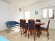 Dining room Lumbarda, Dining room in the apartment, air condition available and WiFi.