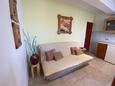 Lumbarda, Sala de estar in the apartment, (pet friendly) y WiFi.