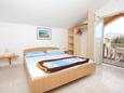Ložnice Lumbarda, Ložnice v ubytování typu studio-apartment, domácí mazlíčci povoleni a WiFi.